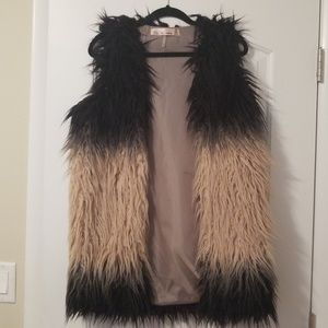Shop Hope's faux "fur" vest